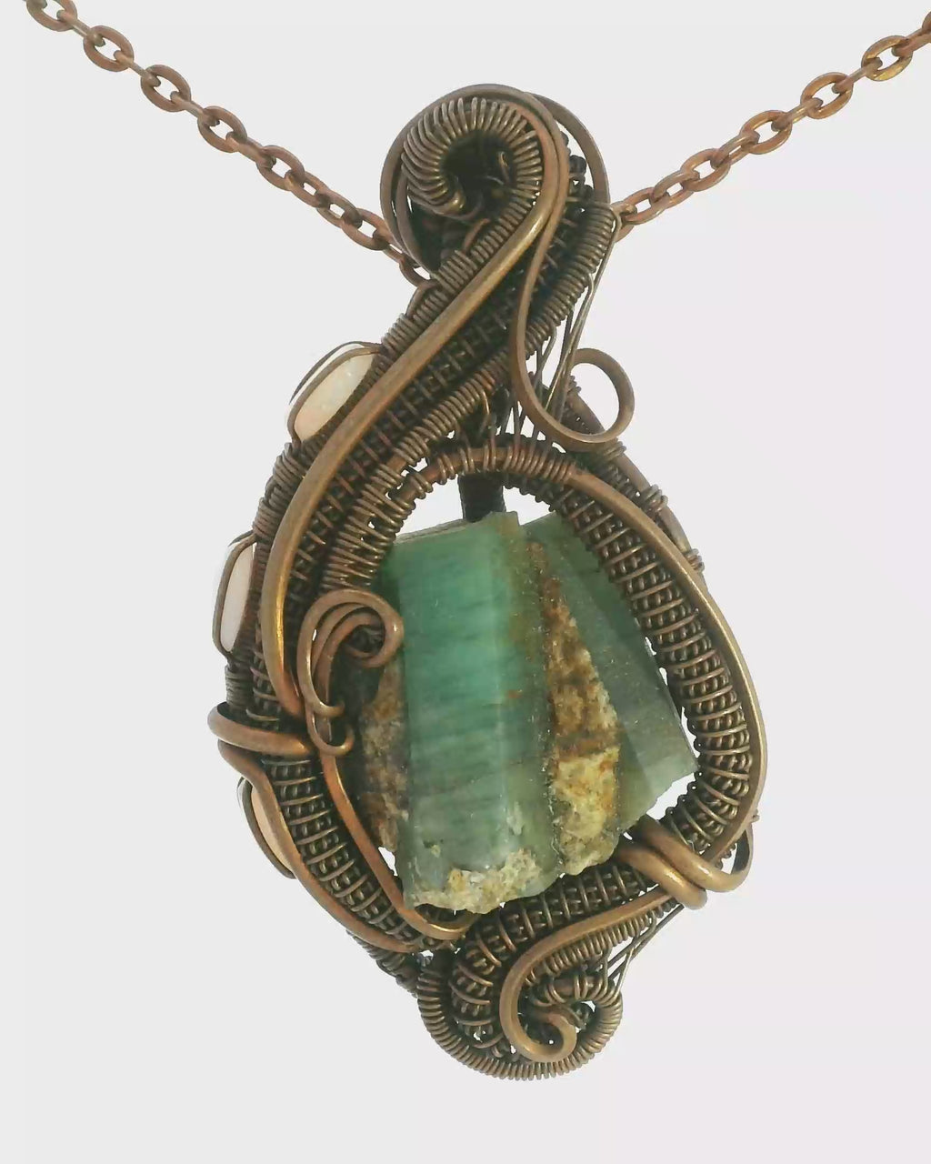 Natural Emerald + Copper wirewrap